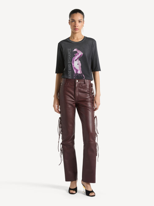 Leather trousers with lacing