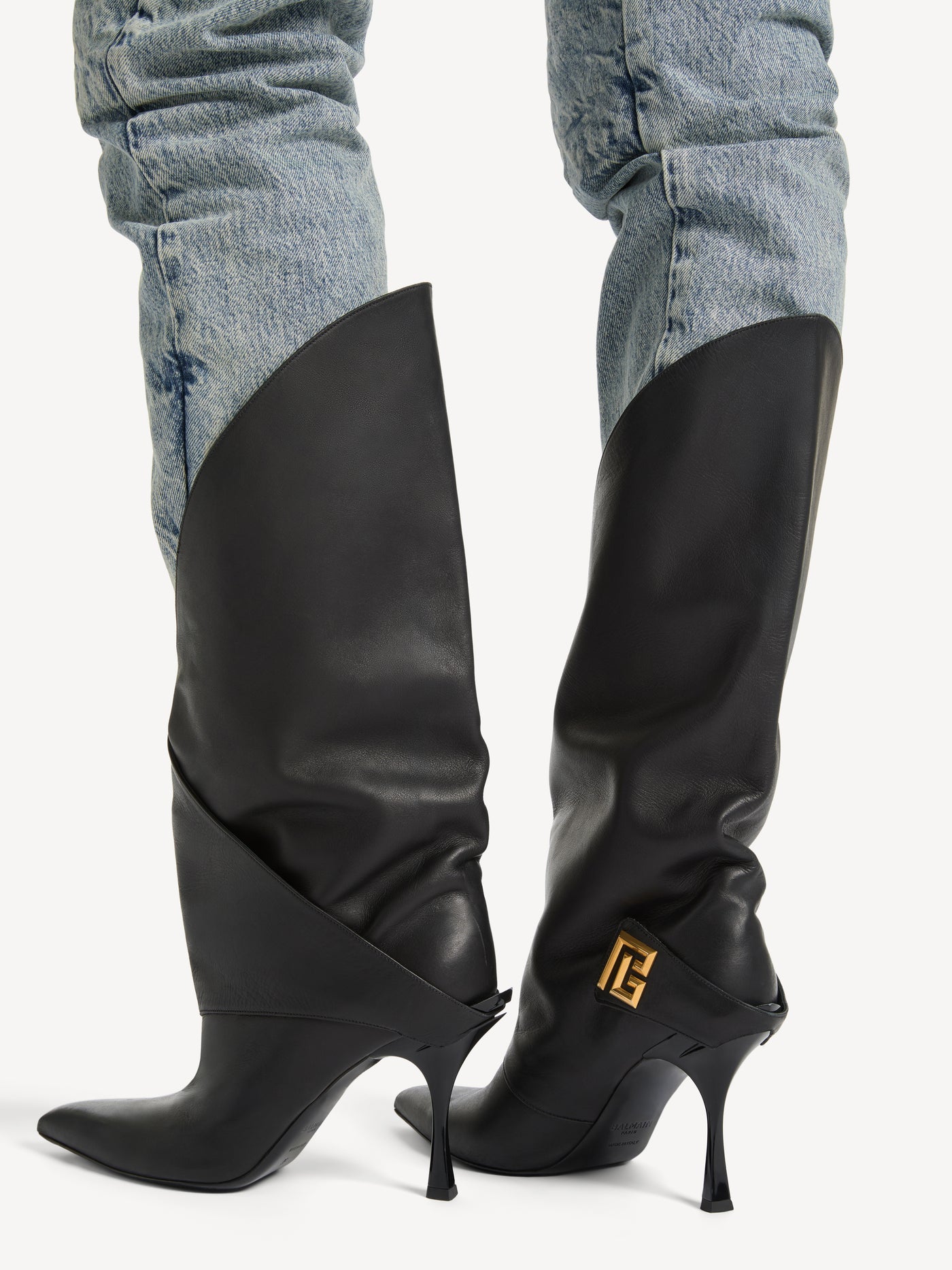 Twist heeled leather boots