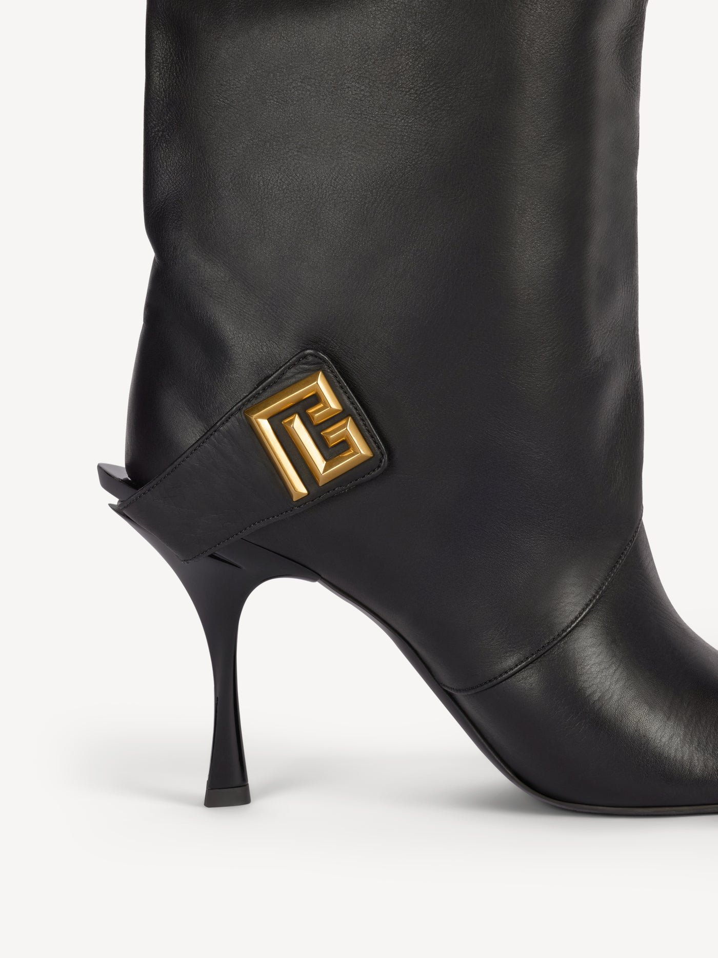 Twist heeled leather boots