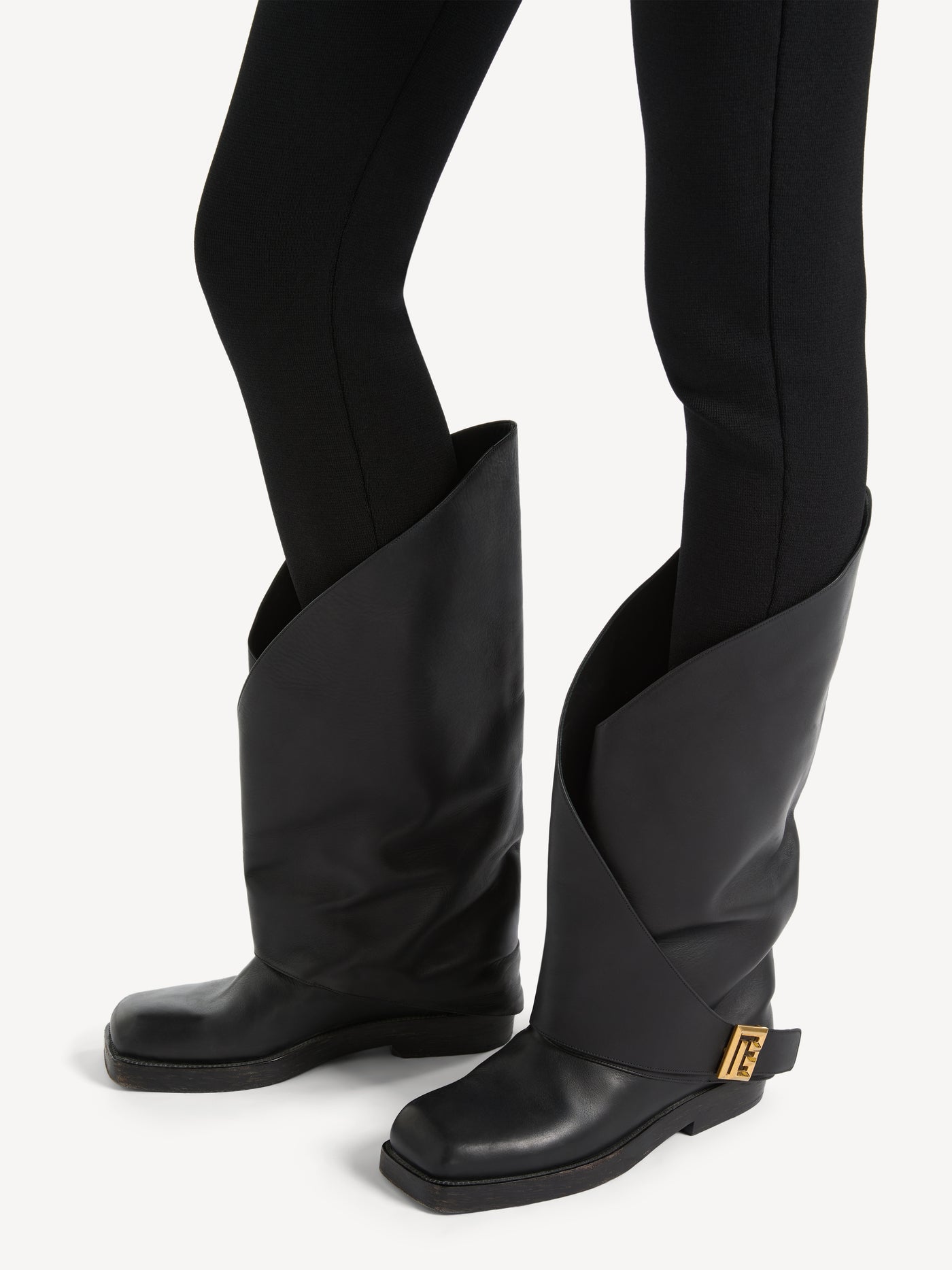 Twist flat leather boots