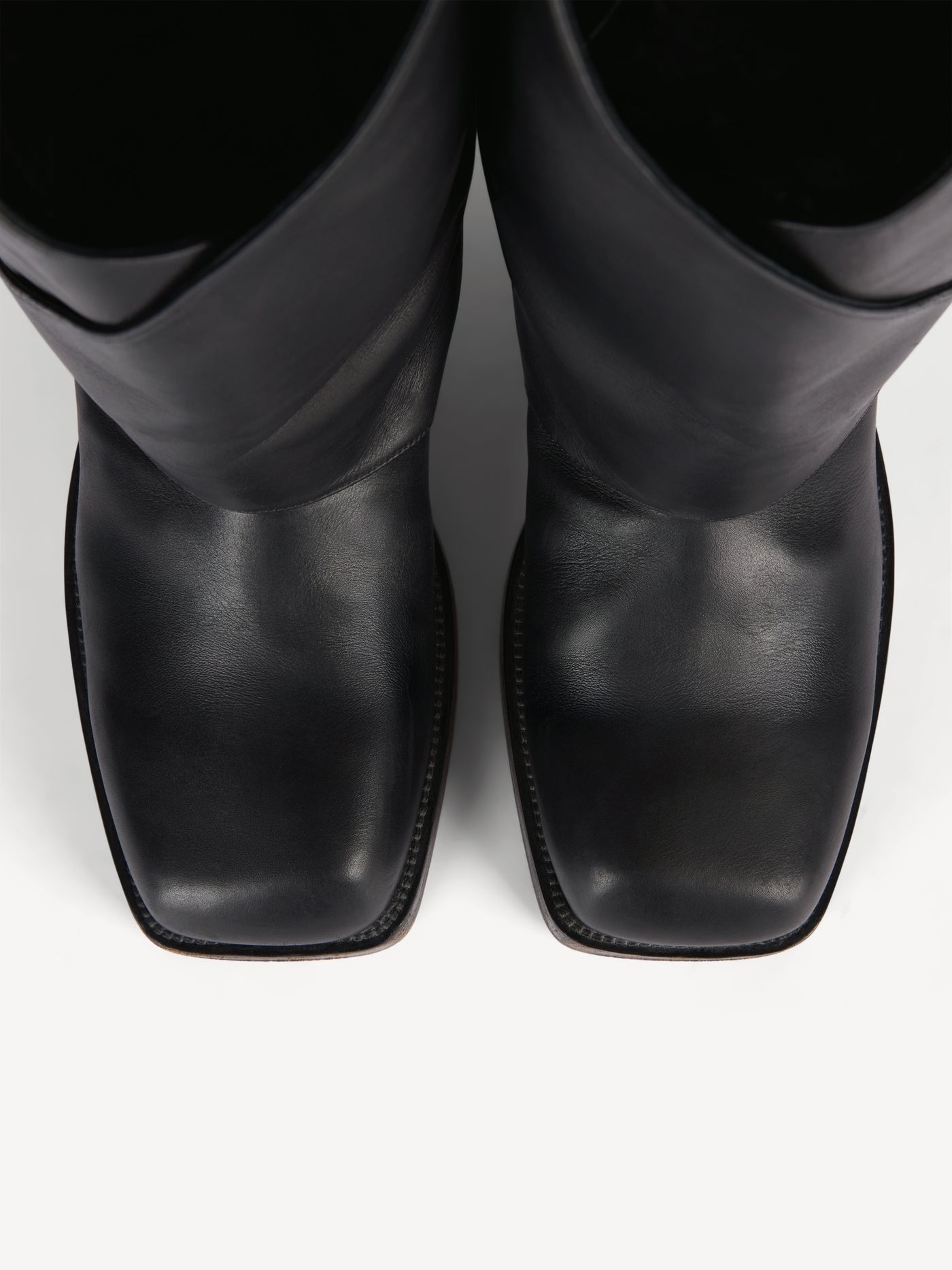Twist flat leather boots