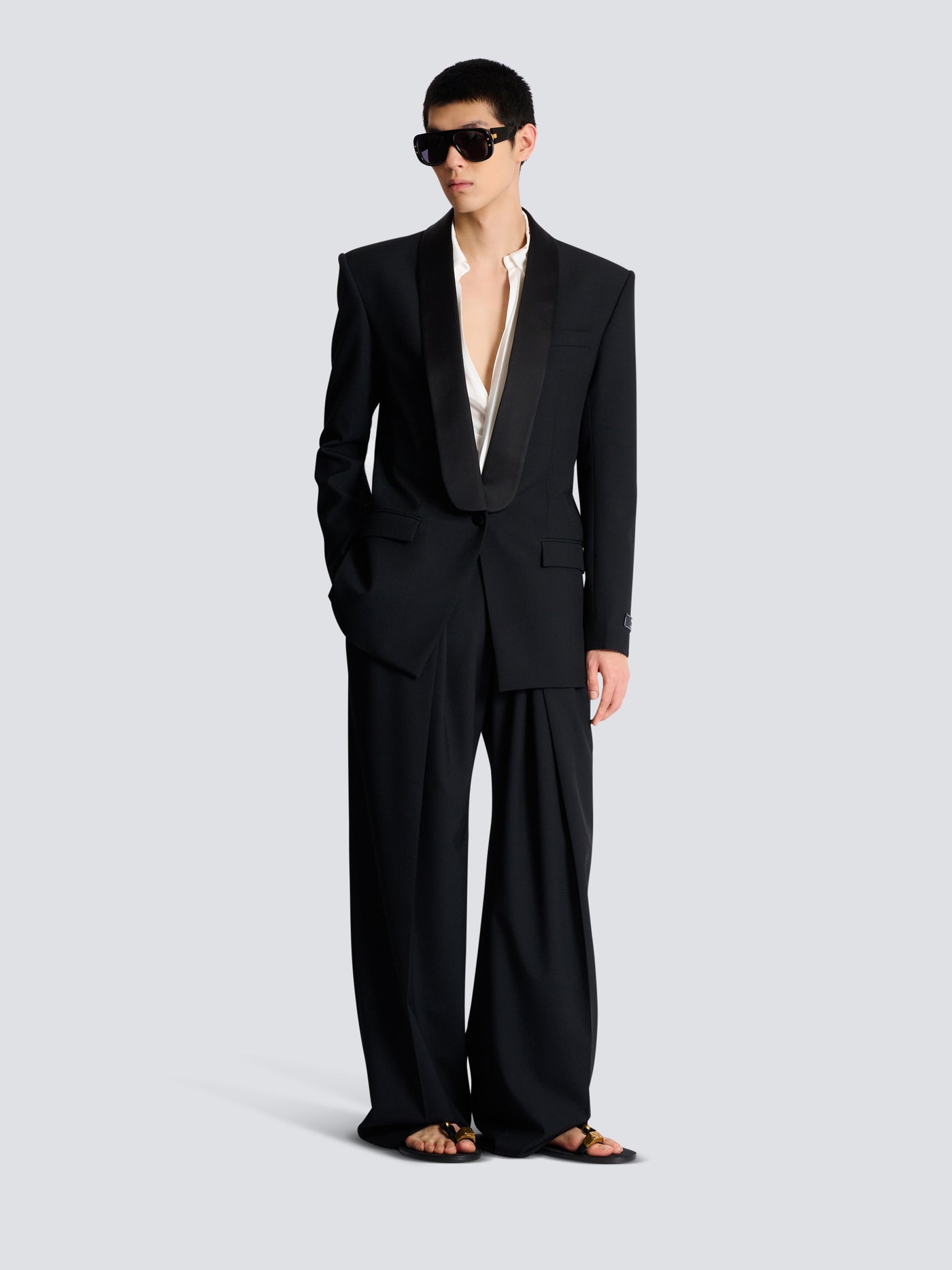 Wool twill trousers with wide knife pleats