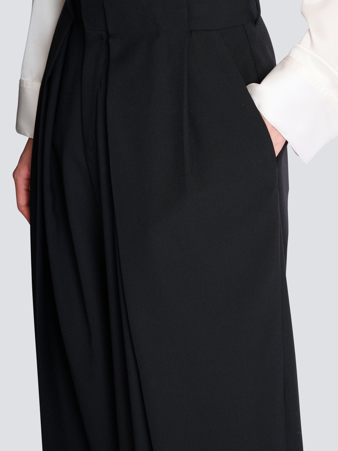 Wool twill trousers with wide knife pleats