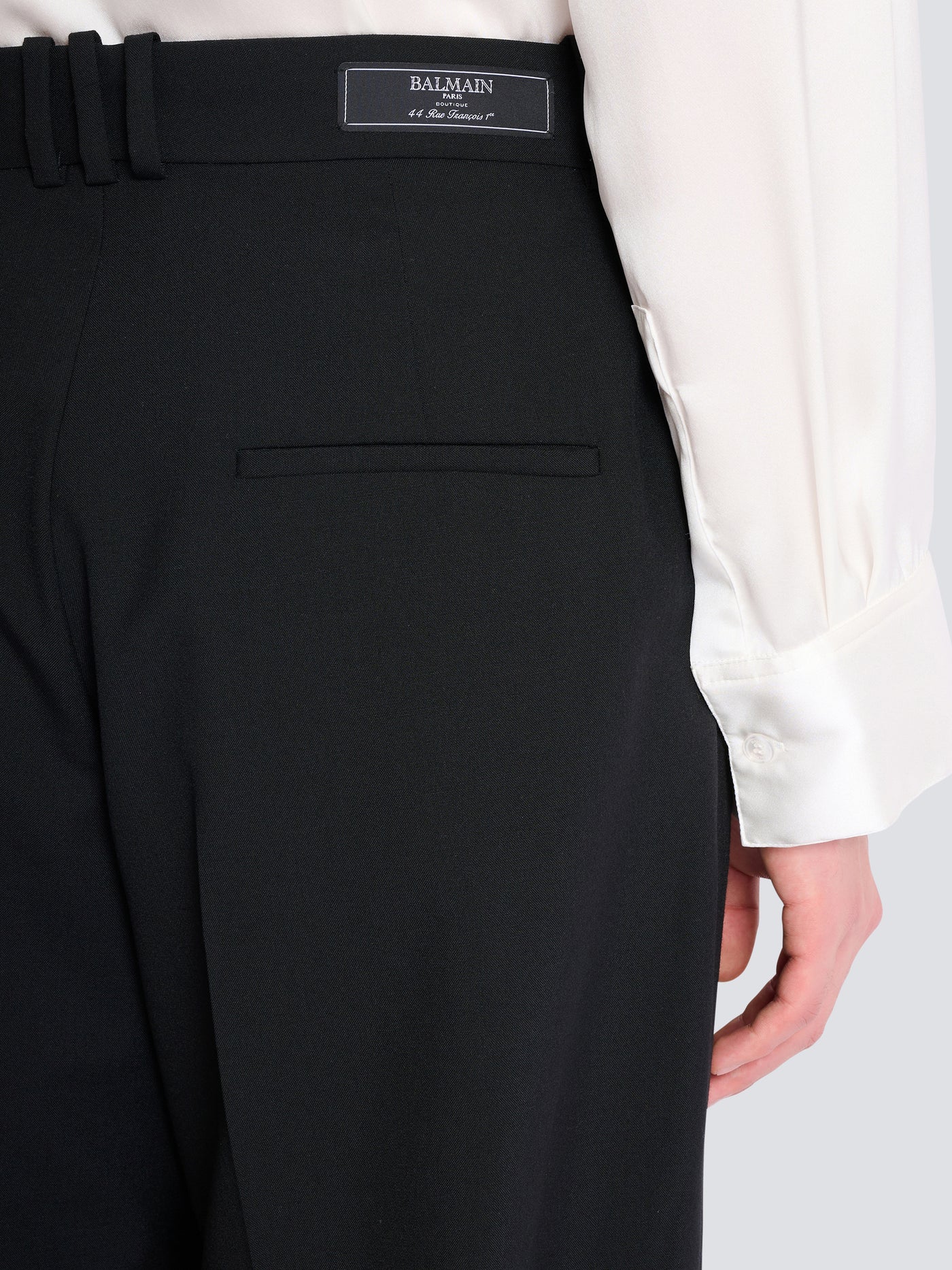 Wool twill trousers with wide knife pleats