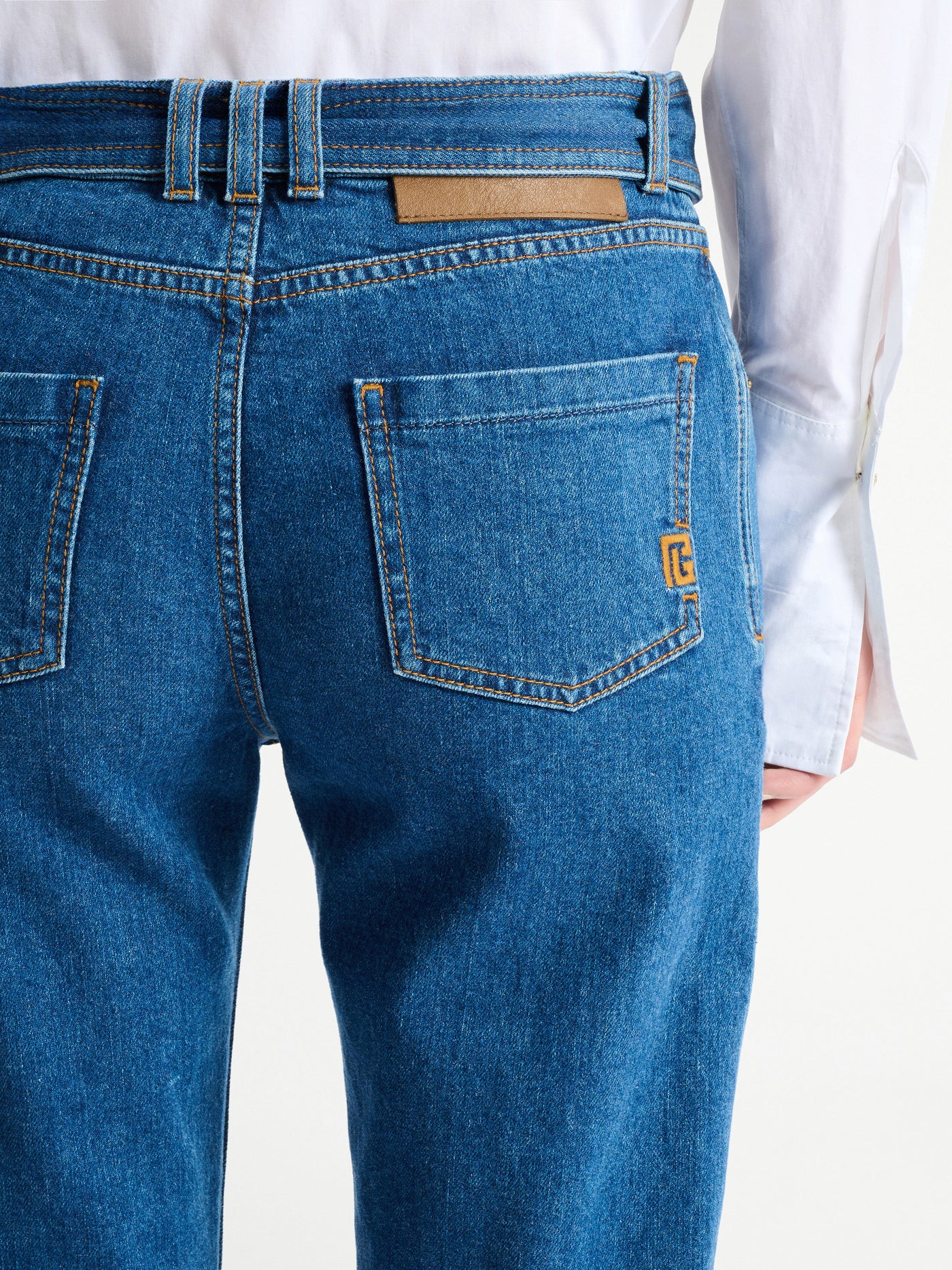 Belted denim jeans