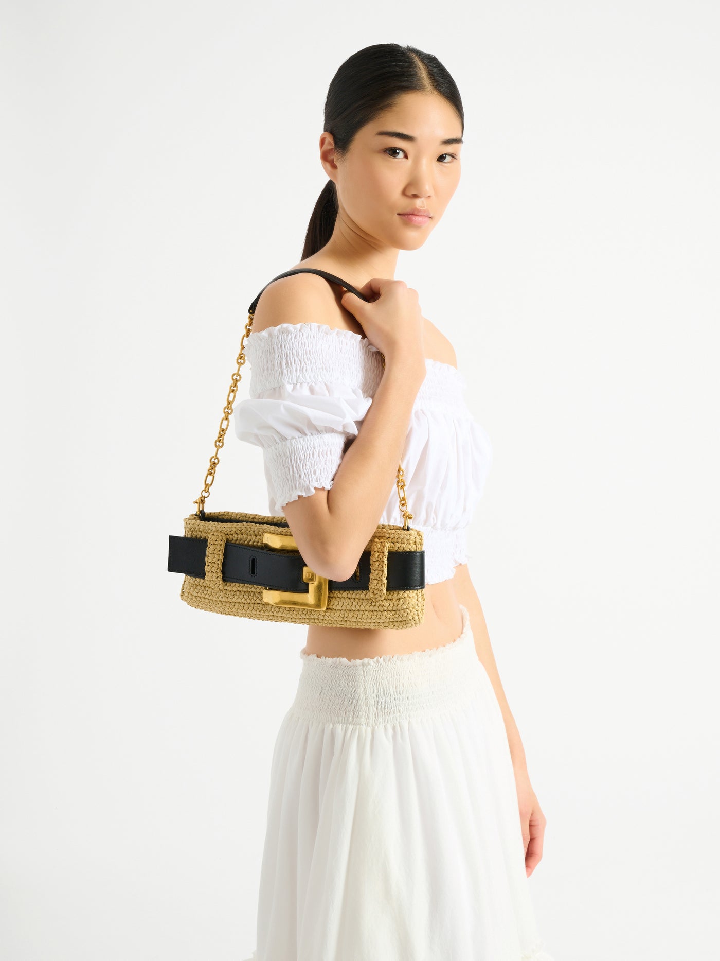 Anthem clutch bag in smooth leather and crochet
