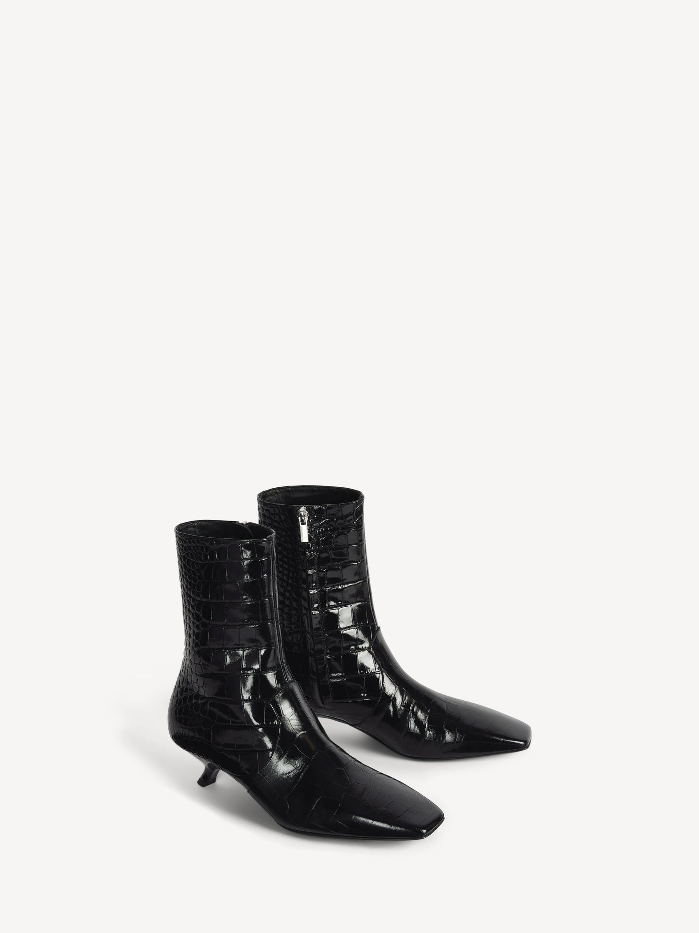 Ankle boots in embossed crocodile-print leather