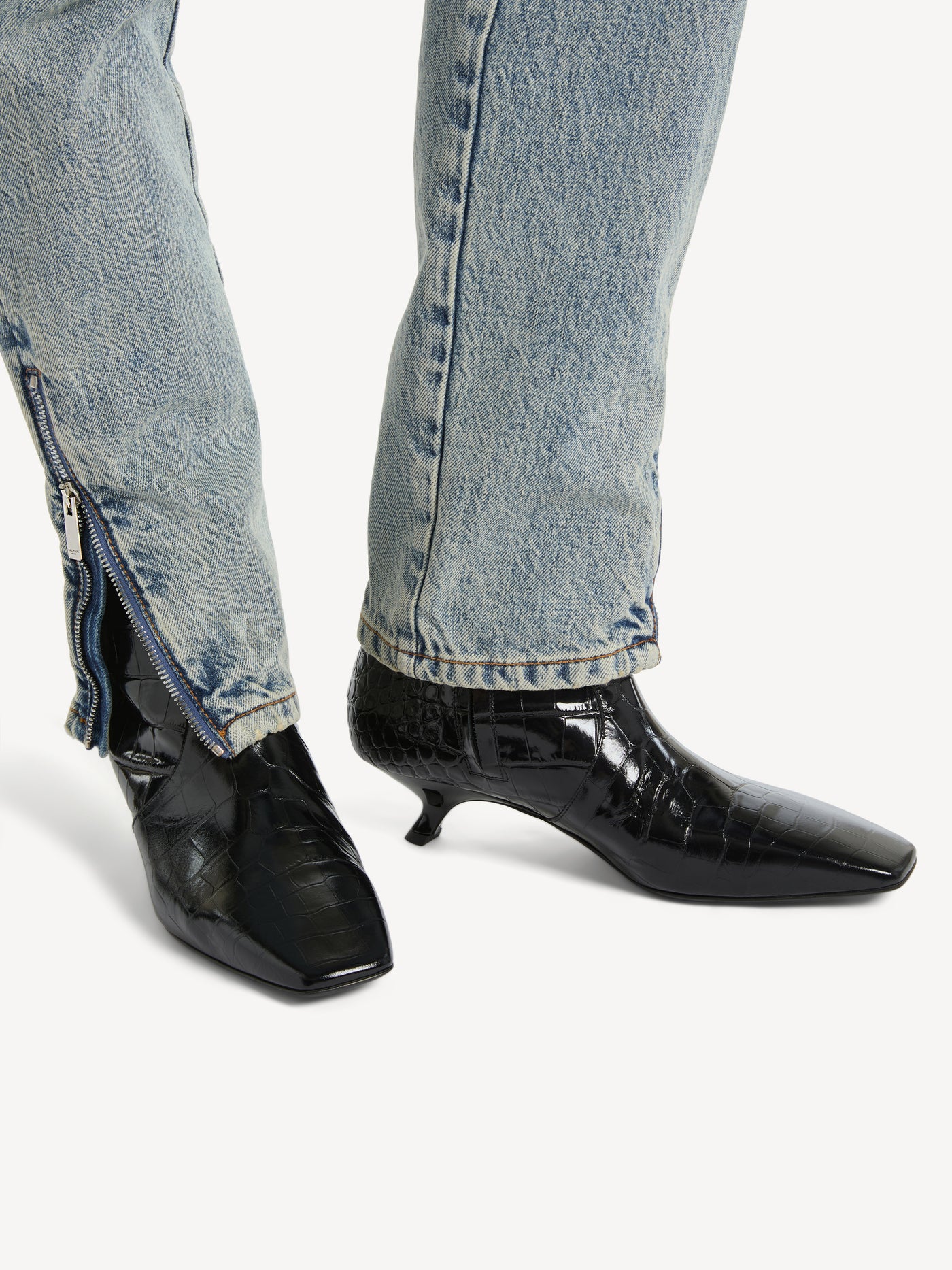 Ankle boots in embossed crocodile-print leather
