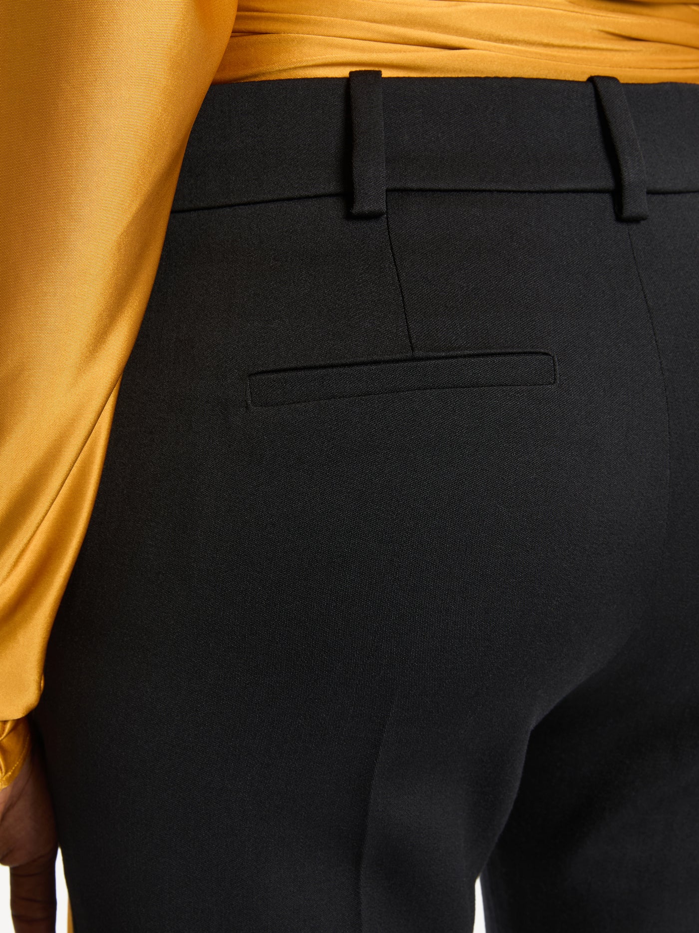 Low-waisted wool satin trousers